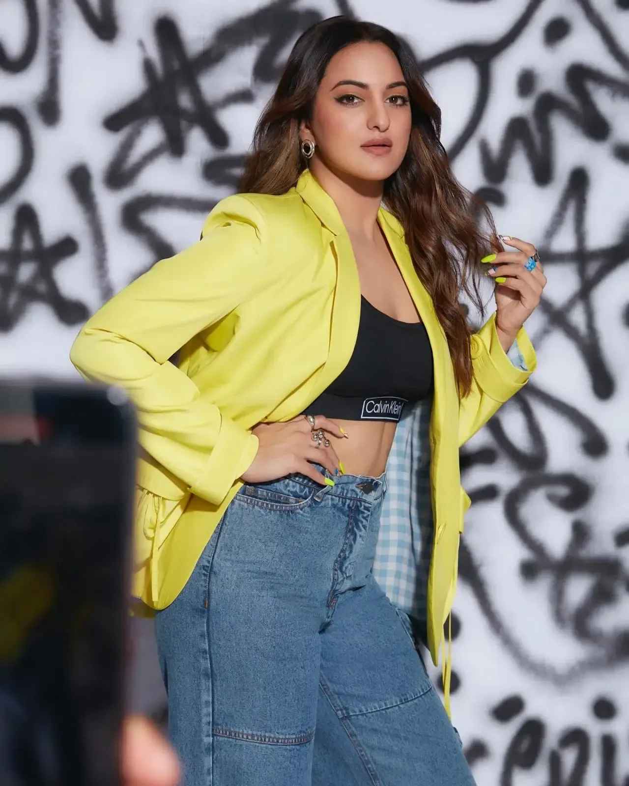 Bollywood Actress Sonakshi Sinha In Black Top Blue Jeans